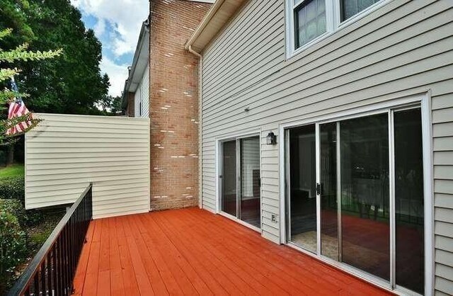 6500 Gaines Ferry Rd Unit A2, Flowery Branch, GA 30542 - view of wooden terrace