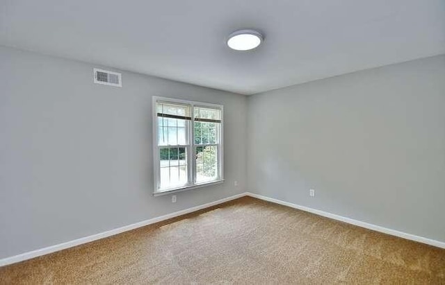 6500 Gaines Ferry Rd Unit A2, Flowery Branch, GA 30542 - carpeted empty room featuring baseboards