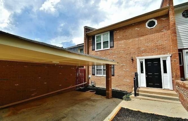 6500 Gaines Ferry Rd Unit A2, Flowery Branch, GA 30542 - property entrance with brick siding
