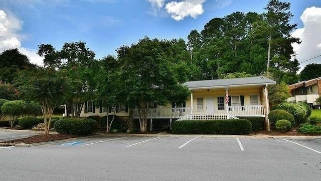 6500 Gaines Ferry Rd Unit A2, Flowery Branch, GA 30542 - view of property featuring uncovered parking