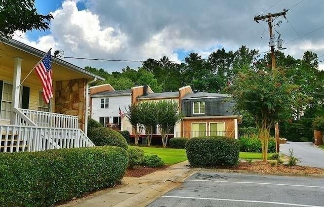 6500 Gaines Ferry Rd Unit A2, Flowery Branch, GA 30542 - view of yard featuring covered porch