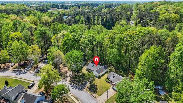 aerial view with a wooded view