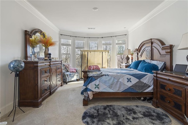 bedroom featuring visible vents, carpet, and ornamental molding