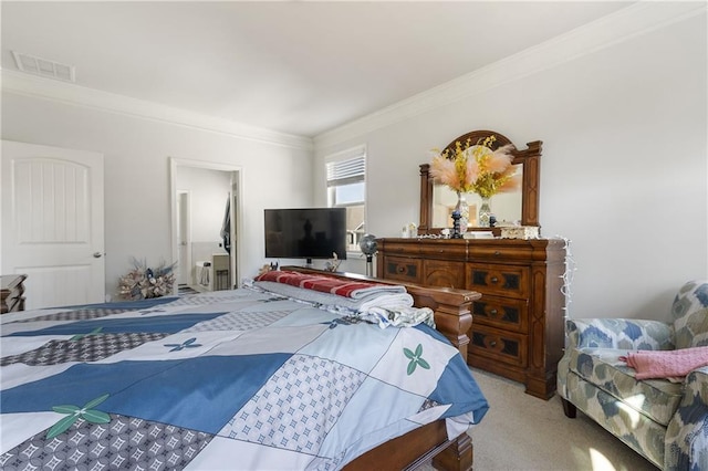 bedroom featuring visible vents, carpet flooring, and ornamental molding