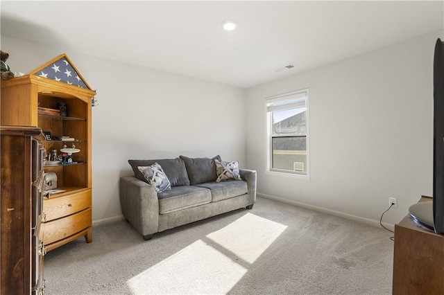 living room featuring recessed lighting, visible vents, light colored carpet, and baseboards