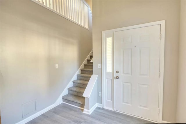 foyer entrance featuring light wood-type flooring