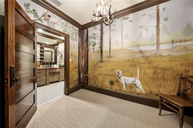 interior space featuring carpet flooring, crown molding, and a notable chandelier