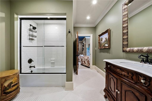 bathroom with vanity, crown molding, combined bath / shower with glass door, and tile flooring