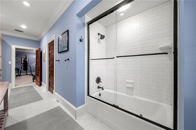 bathroom featuring shower / bath combination with glass door, tile floors, and crown molding