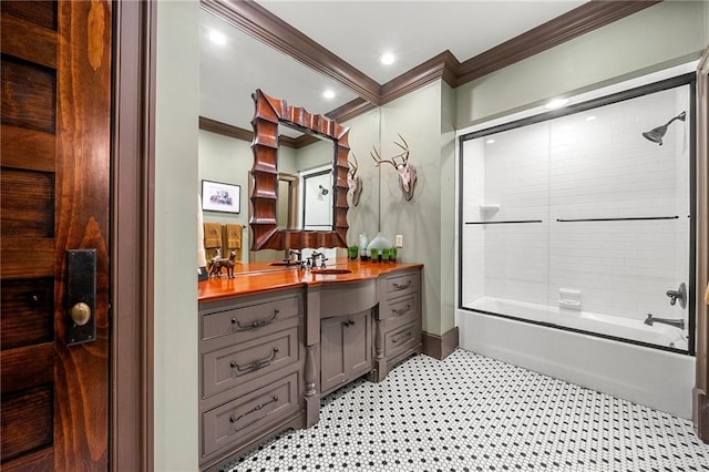 bathroom with ornamental molding, shower / tub combination, tile floors, and vanity