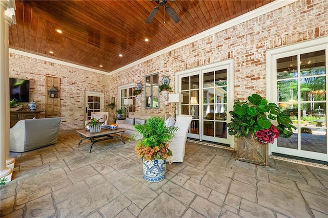 view of patio / terrace featuring ceiling fan