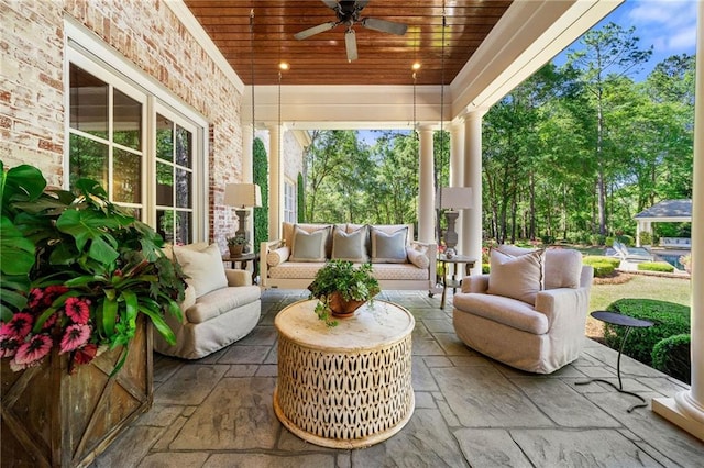 view of patio / terrace featuring an outdoor living space and ceiling fan