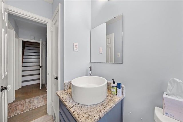 1649 Beecher St SW, Atlanta, GA 30310 - bathroom with vanity, wood finished floors, and toilet