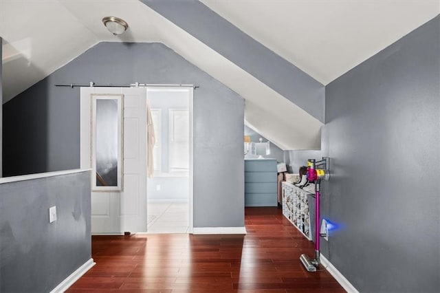1649 Beecher St SW, Atlanta, GA 30310 - additional living space featuring wood finished floors, vaulted ceiling, and baseboards