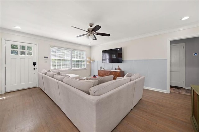 1649 Beecher St SW, Atlanta, GA 30310 - living room featuring a ceiling fan, light wood-type flooring, ornamental molding, recessed lighting, and a wainscoted wall