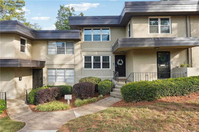 view of property with stucco siding