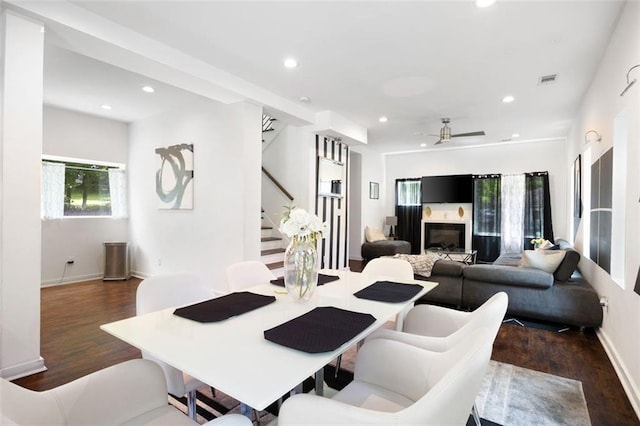 1463 Macklone St NE, Atlanta, GA 30307 - living area featuring wood finished floors, stairway, a glass covered fireplace, recessed lighting, and a ceiling fan