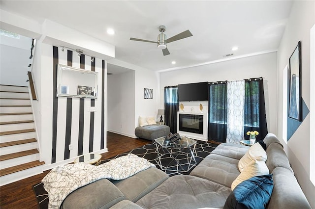 1463 Macklone St NE, Atlanta, GA 30307 - living room featuring wood finished floors, stairs, a ceiling fan, recessed lighting, and a glass covered fireplace