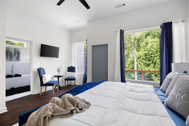 1463 Macklone St NE, Atlanta, GA 30307 - bedroom with wood finished floors and a ceiling fan