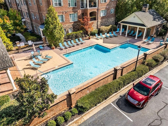 view of swimming pool featuring a patio area