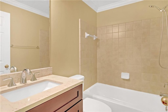 full bathroom featuring vanity, tiled shower / bath combo, ornamental molding, and toilet