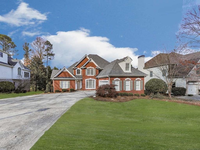 view of front of home with a front lawn