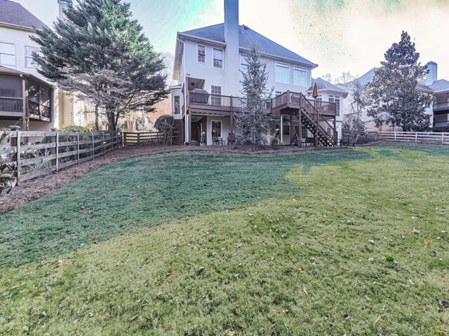 view of yard featuring a wooden deck