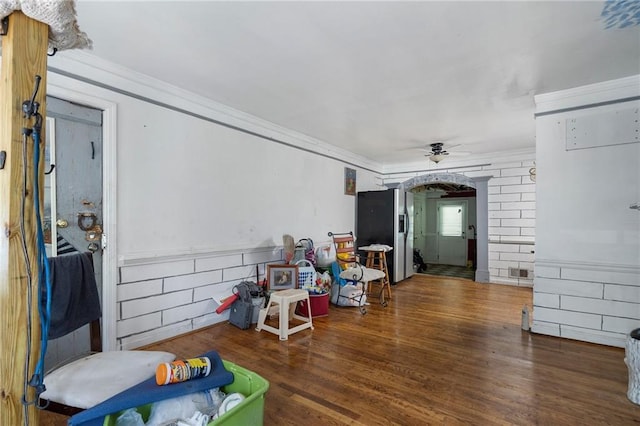 1550 Bells Ferry Rd, Marietta, GA 30066 - miscellaneous room with ornamental molding, ceiling fan, wood finished floors, and arched walkways