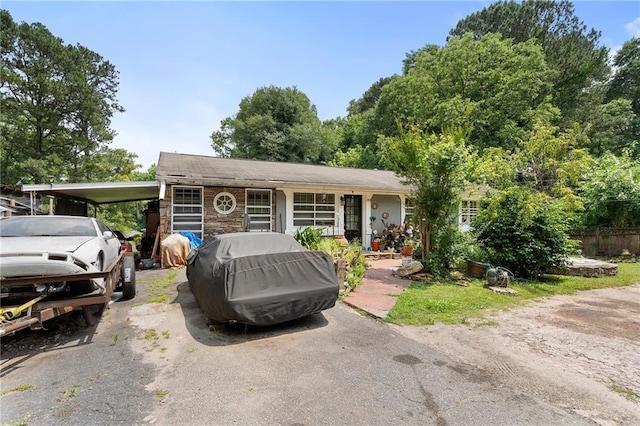1550 Bells Ferry Rd, Marietta, GA 30066 - view of front of property with driveway and a carport