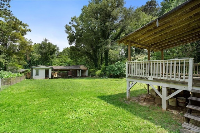 1550 Bells Ferry Rd, Marietta, GA 30066 - view of yard featuring a deck and an outdoor structure