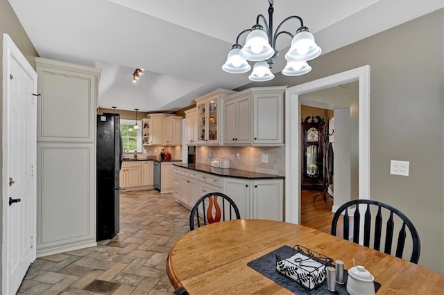 11 Crossbridge Ct SW, Cartersville, GA 30120 - dining room featuring a chandelier and brick patterned floors