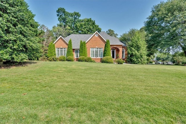 11 Crossbridge Ct SW, Cartersville, GA 30120 - view of front facade featuring a front lawn and brick siding