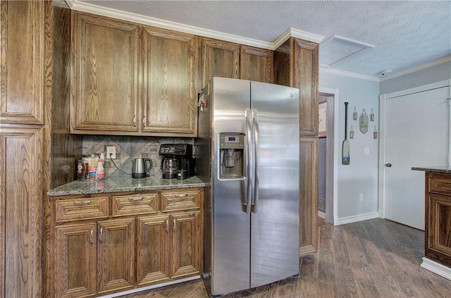 kitchen with stainless steel fridge with ice dispenser, dark hardwood / wood-style flooring, crown molding, stone countertops, and decorative backsplash