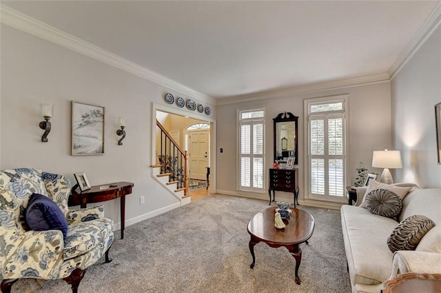 living room with ornamental molding and light colored carpet