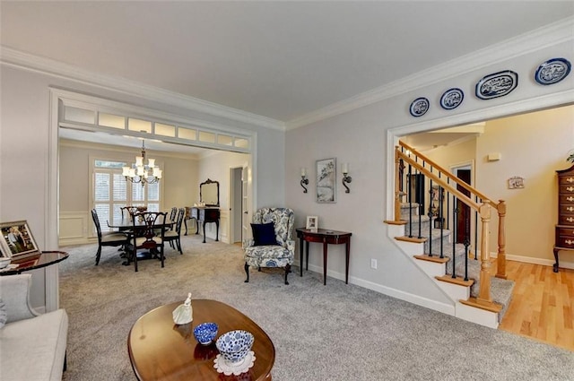 living room with crown molding, a notable chandelier, and carpet floors