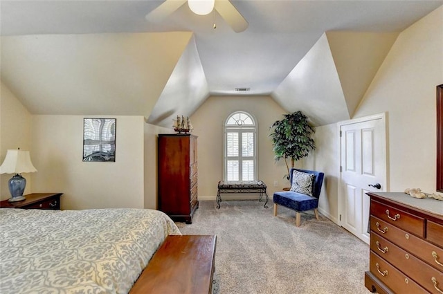 bedroom with vaulted ceiling, light carpet, and ceiling fan