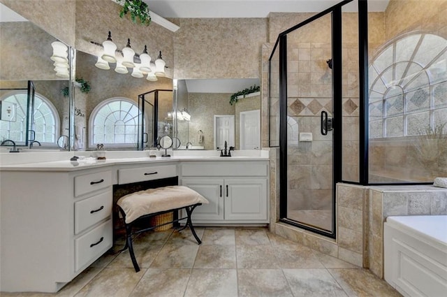 bathroom with vanity, shower with separate bathtub, and tile patterned flooring