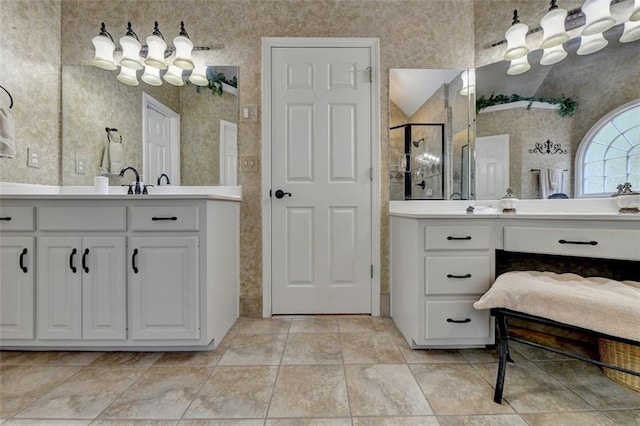 bathroom featuring vanity, tile patterned floors, and an enclosed shower