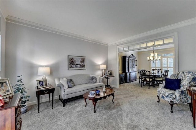 living room with an inviting chandelier, ornamental molding, and carpet flooring