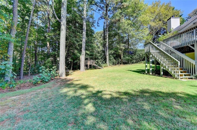 view of yard with a deck