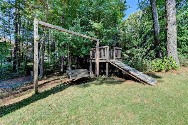 view of jungle gym with a lawn