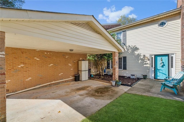 6500 Gaines Ferry Rd Unit E4, Flowery Branch, GA 30542 - view of patio / terrace featuring a carport