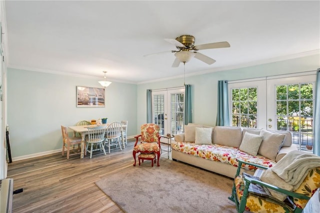 6500 Gaines Ferry Rd Unit E4, Flowery Branch, GA 30542 - living area with french doors, ornamental molding, wood finished floors, ceiling fan, and baseboards