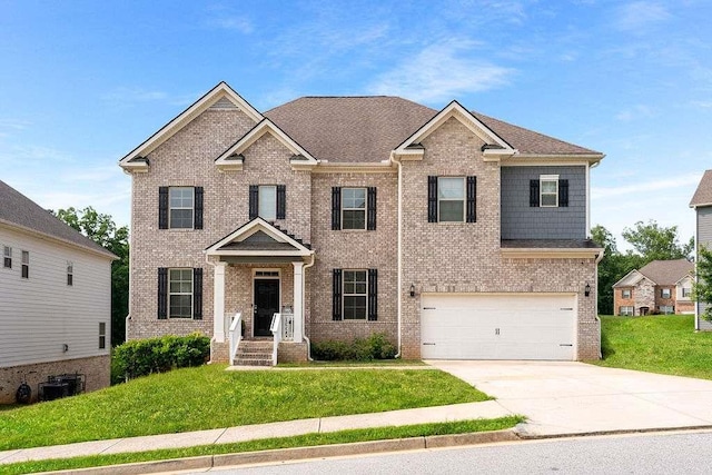 3692 Wartrace Dr, South Fulton, GA 30331 - view of front of house with brick siding, concrete driveway, a front lawn, and an attached garage