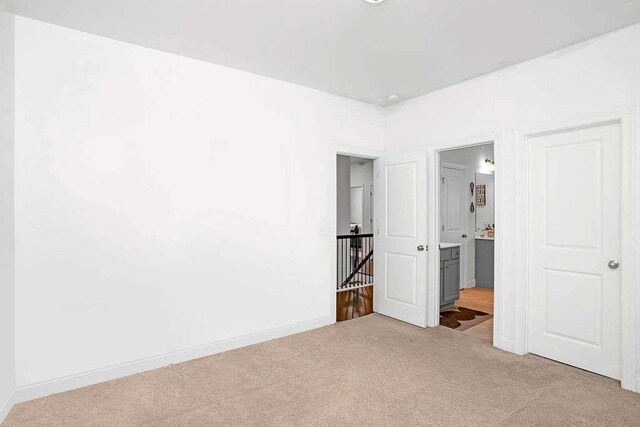 3692 Wartrace Dr, South Fulton, GA 30331 - unfurnished bedroom with carpet, baseboards, and ensuite bathroom