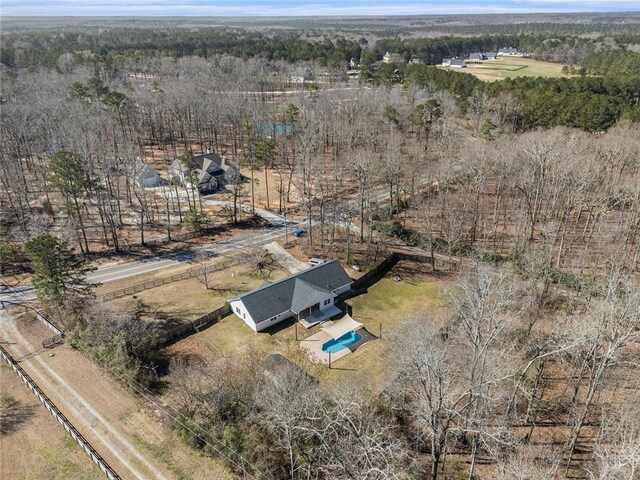 bird's eye view with a view of trees