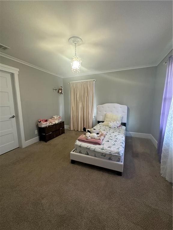 bedroom featuring crown molding, dark carpet, and a notable chandelier