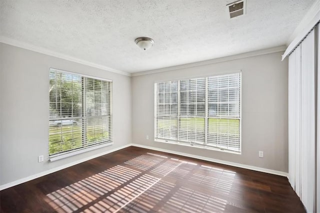 5555 Mountain Springs Cir, Stone Mountain, GA 30088 - empty room with ornamental molding, a textured ceiling, baseboards, and wood finished floors