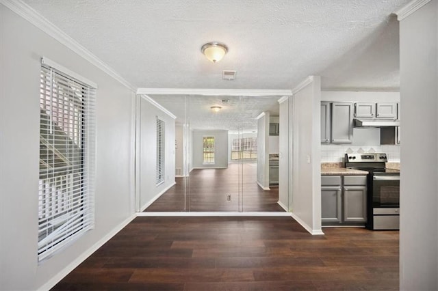 5555 Mountain Springs Cir, Stone Mountain, GA 30088 - hallway featuring ornamental molding, a textured ceiling, dark wood-style floors, and baseboards