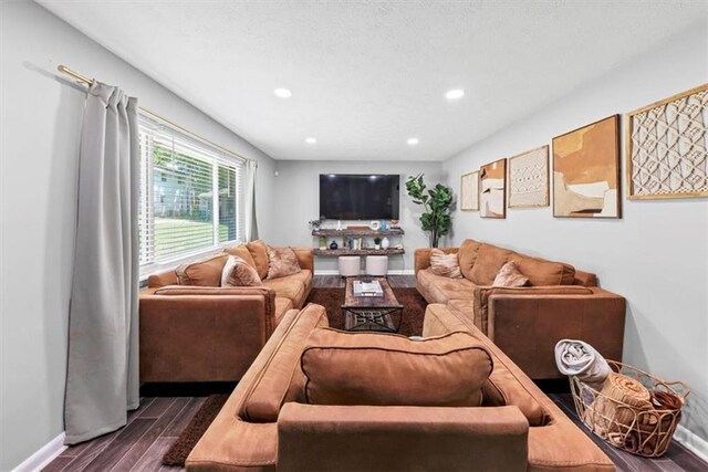 7371 Ovis Ct, Riverdale, GA 30274 - living area with a textured ceiling, baseboards, recessed lighting, and dark wood-type flooring